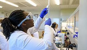 An SPU student working in the chemistry lab